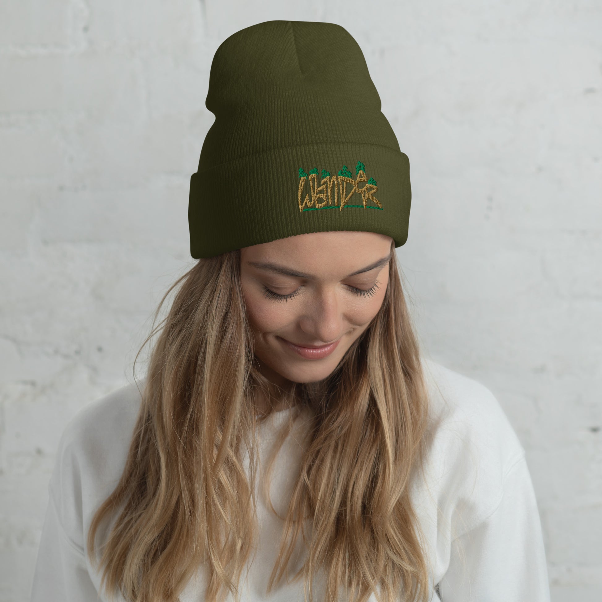 cuffed beanie, olive front model, embroidered wander, three in the trees