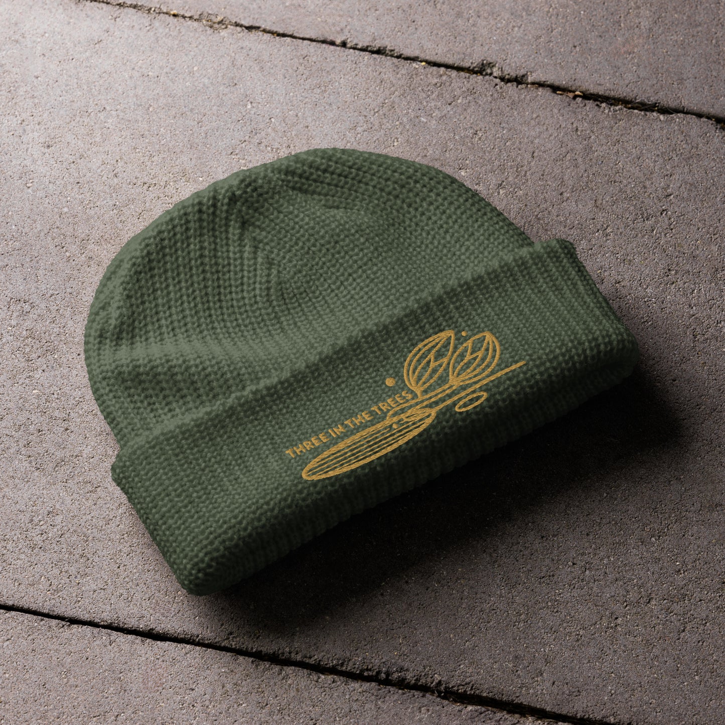 fisherman beanie, cypress, Three in the Trees laid out design embroidered