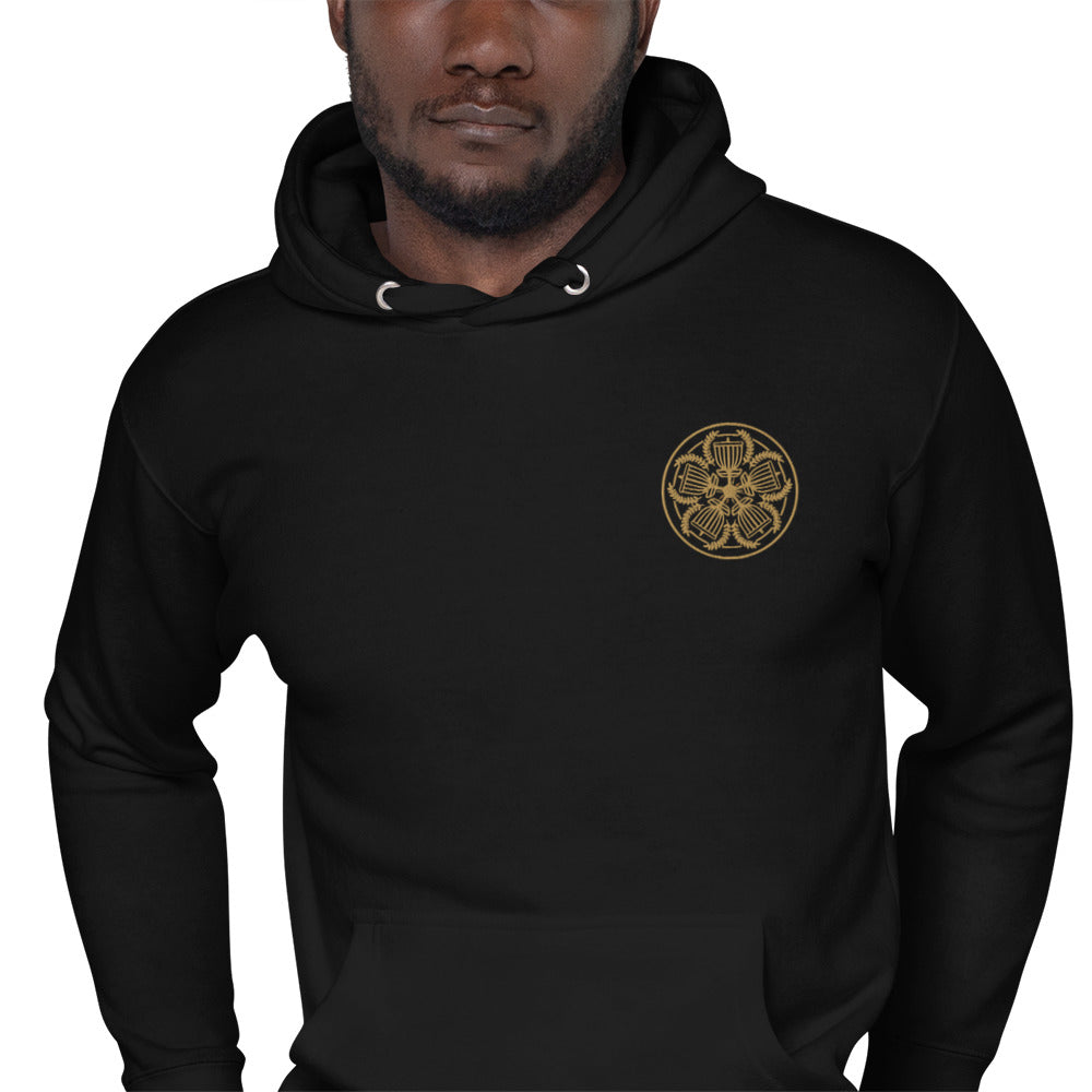 premium hoodie featuring the Varsity Disc embroidery by Three In The Trees, model, black