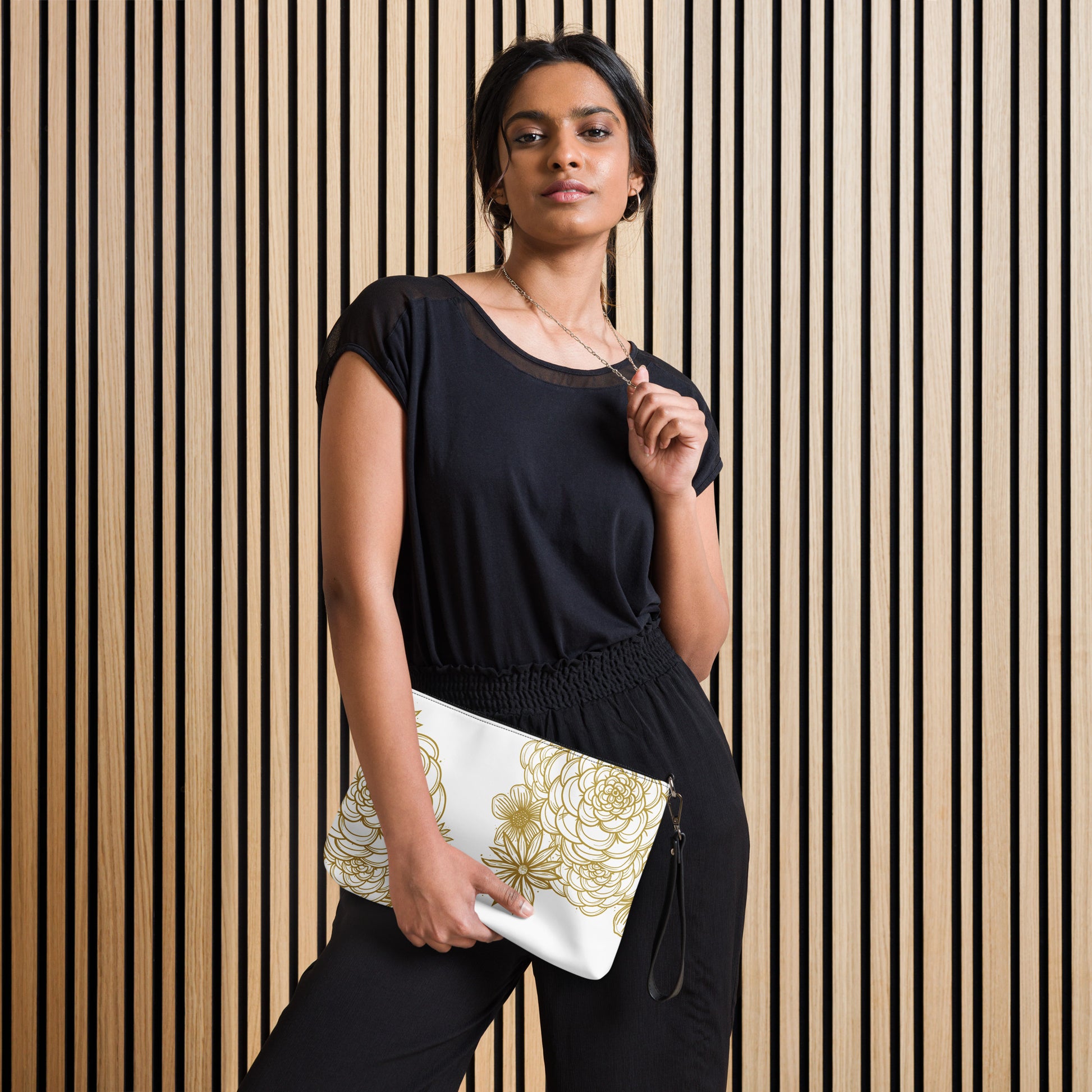 all over print crossbody bag, black strap, faux leather, white, gold tone digitally hand drawn floral print, model