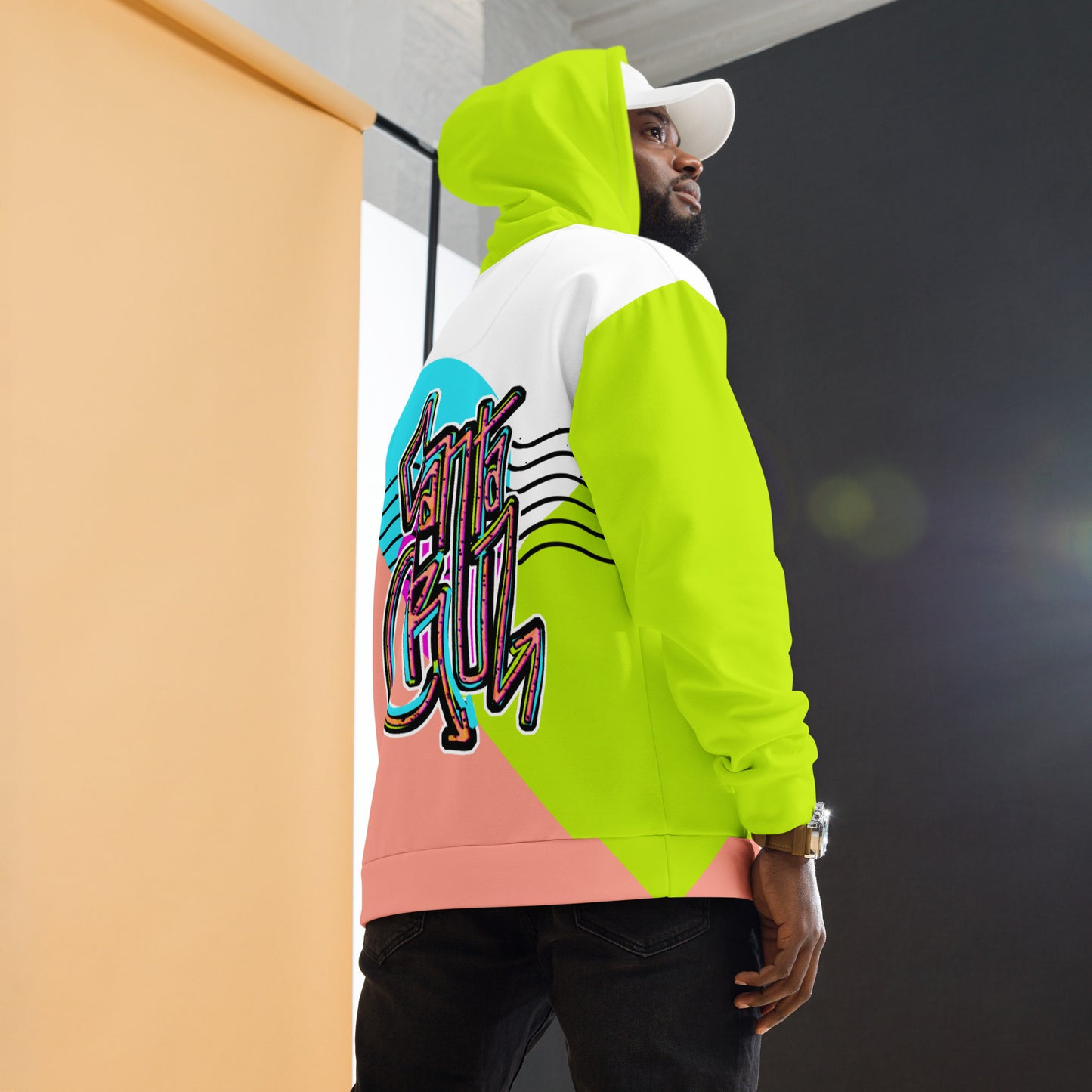 all over print unisex hoodie, bright color block design with retro graffiti Santa Cruz, model