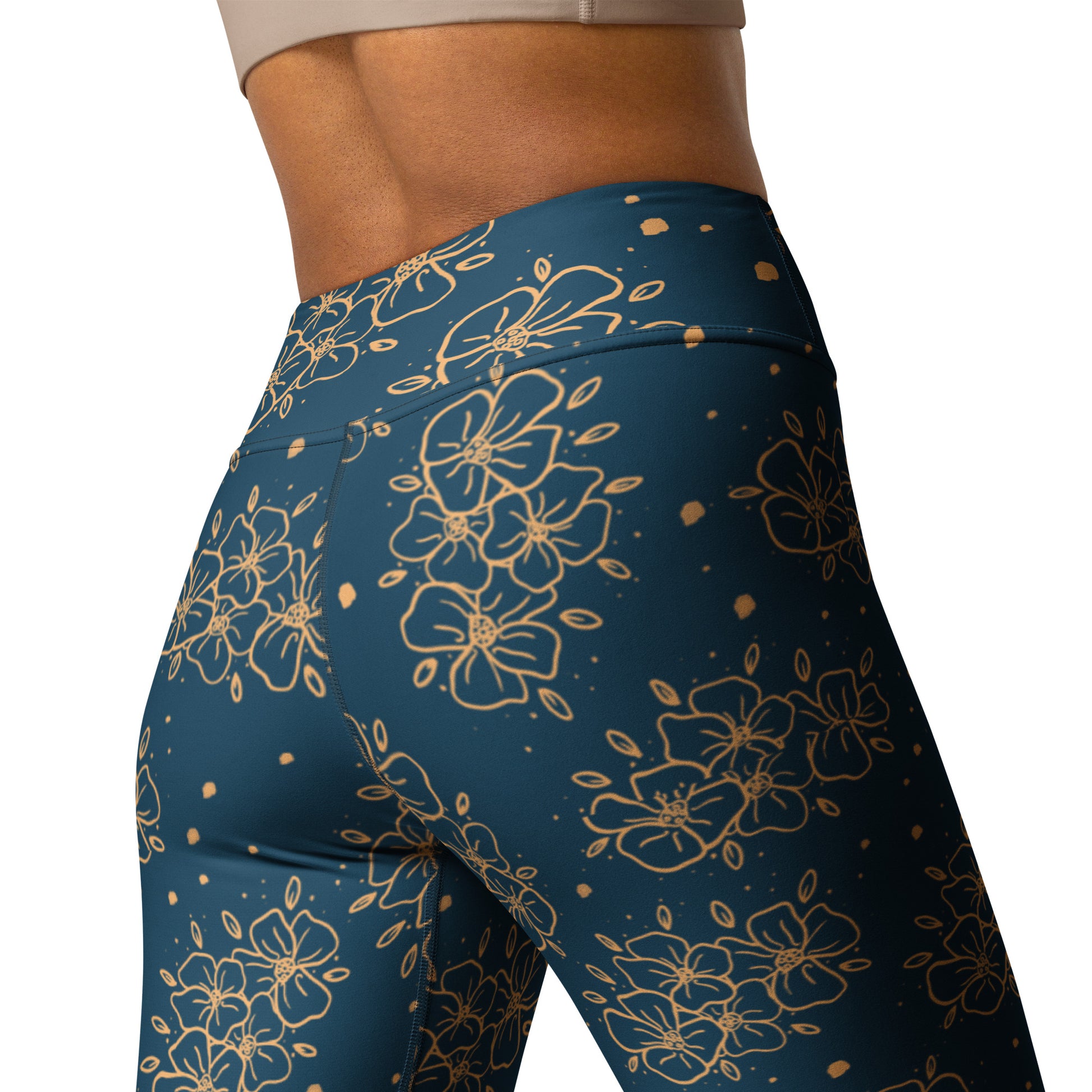 all over print yoga leggings, blue green with ochre blossom print, Clara design, model back