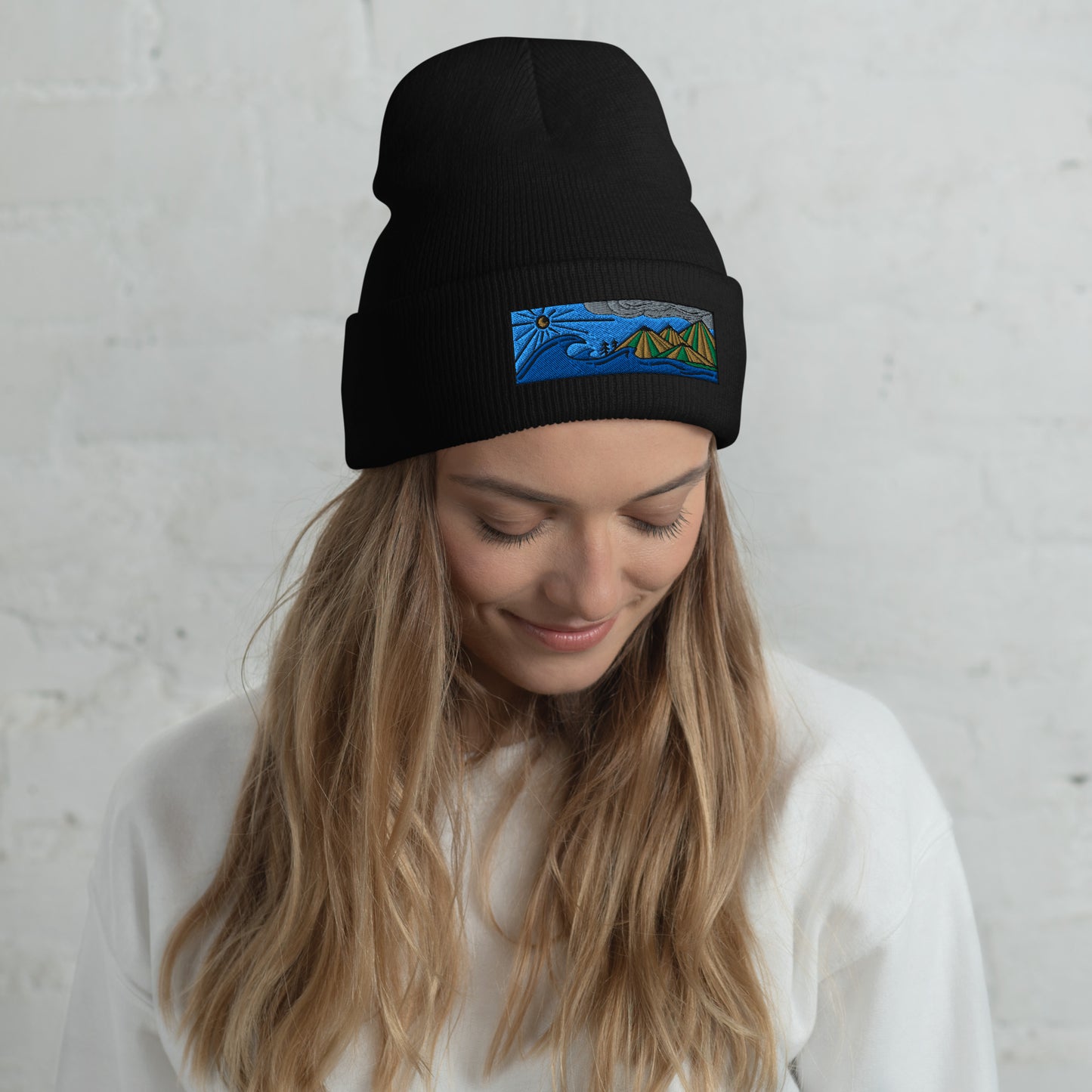 cuffed beanie, colored embroidery of seascape and mountains, black, model