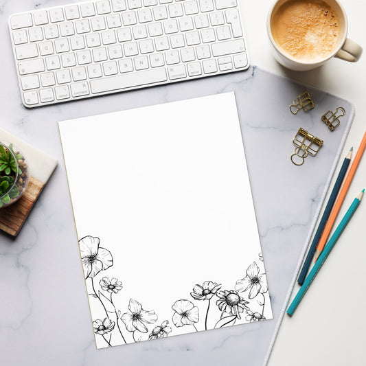 notepad with ink drawing of various spring flowers 